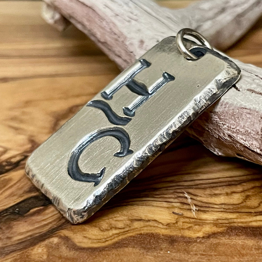 mens custom silver necklace pendant with logo or brand engraved and oxidized to stand out. Rustic detailed edges.  Ella Joli