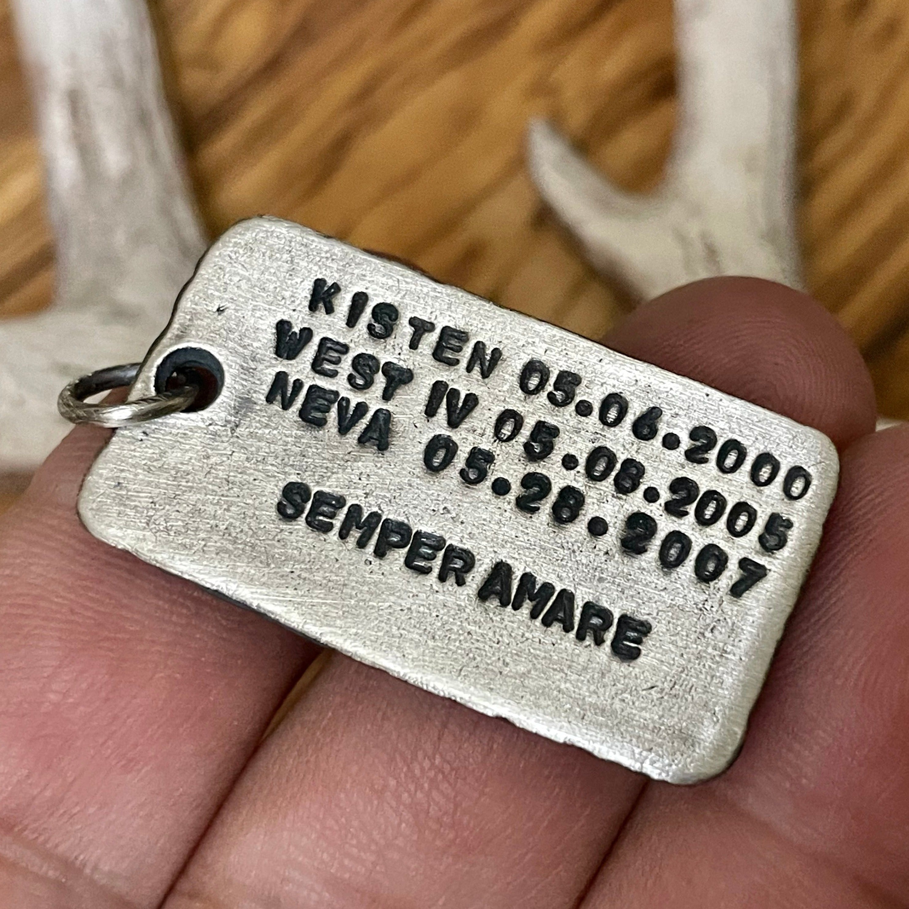 Example of personalized back side of our men's thick and chunky silver pendants. Names and dates with a special quote shown.