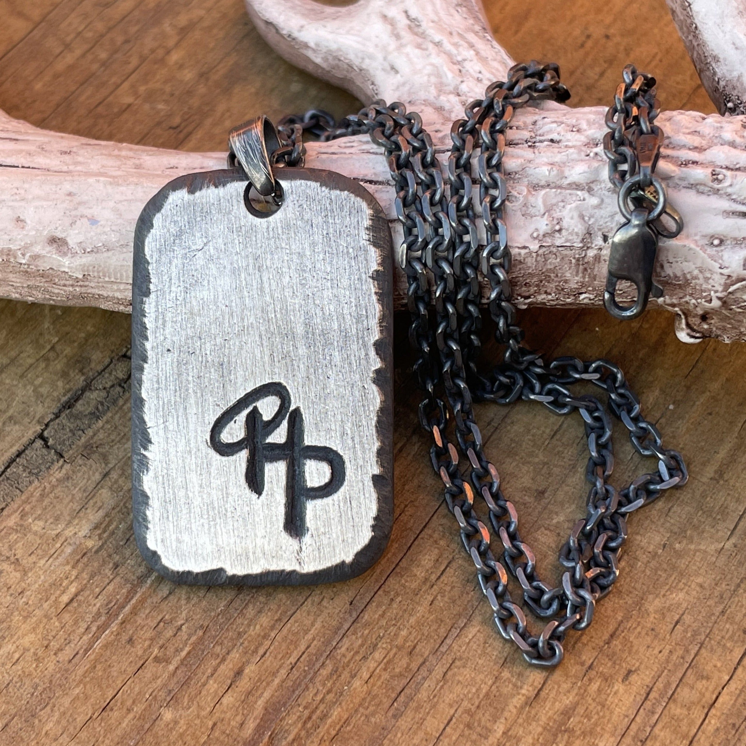 Custom Silver Ranch Brand Pendant for Men.  1.5 inch shown in rustic matte finish with chain upgrade and halo, mashed o, goose egg..