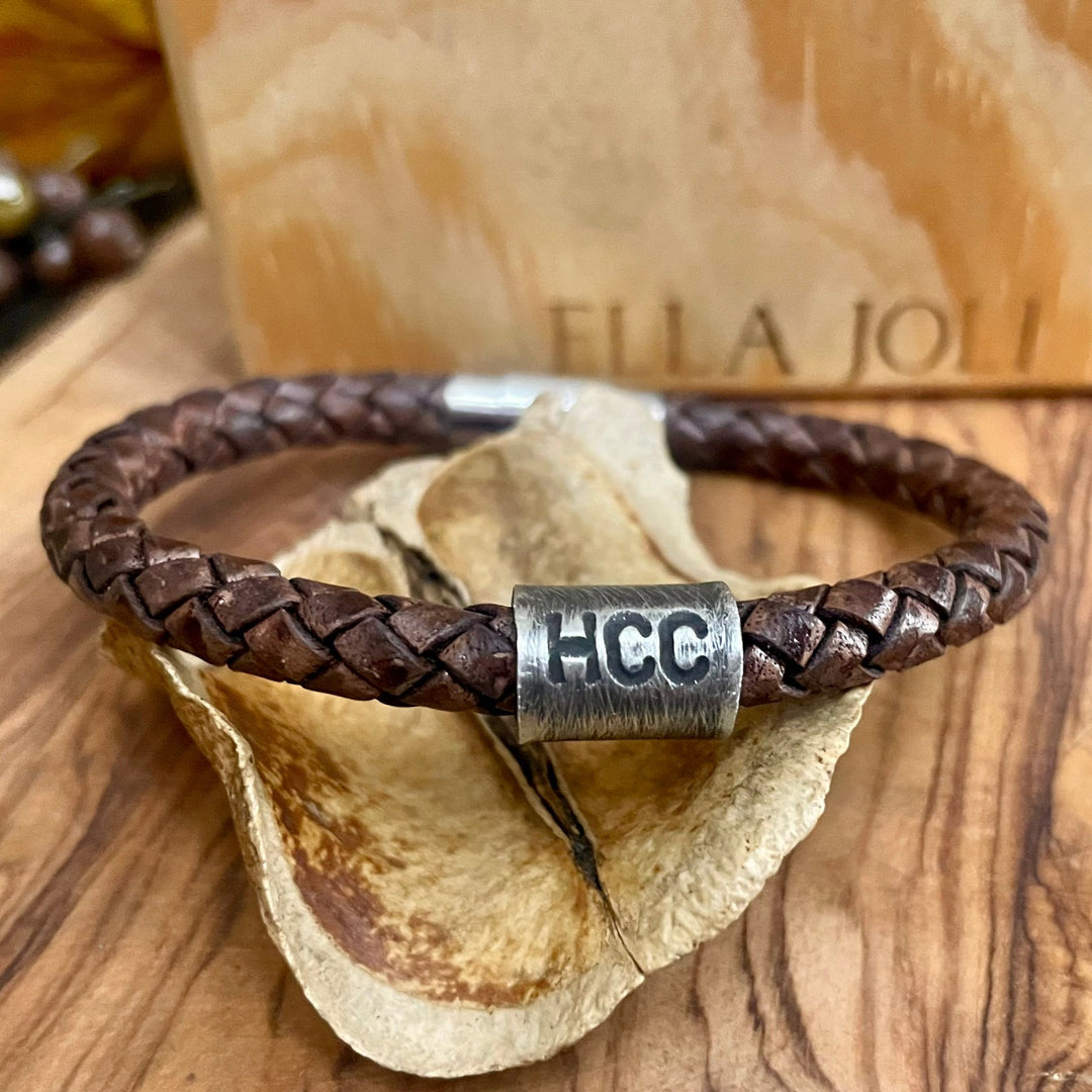 Personalized Leather Bracelet shown with three initials in dark brown leather. 6mm thick, choice of length