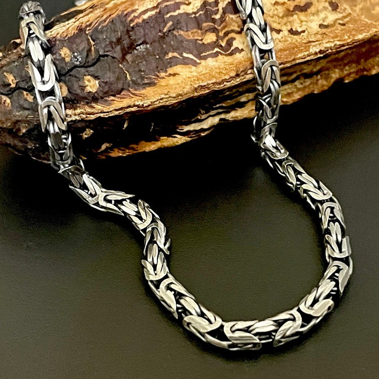 Byzantine Chain Necklace for Men in 3.6mm thick heavy 925 sterling silver oxidized or polished. Antiqued vintage looking chain sitting on brown prop