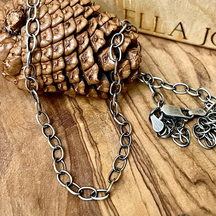 Oxidized Sterling Silver Silver chain necklace for layering, wearing along or with a pendant, on a wooden surface