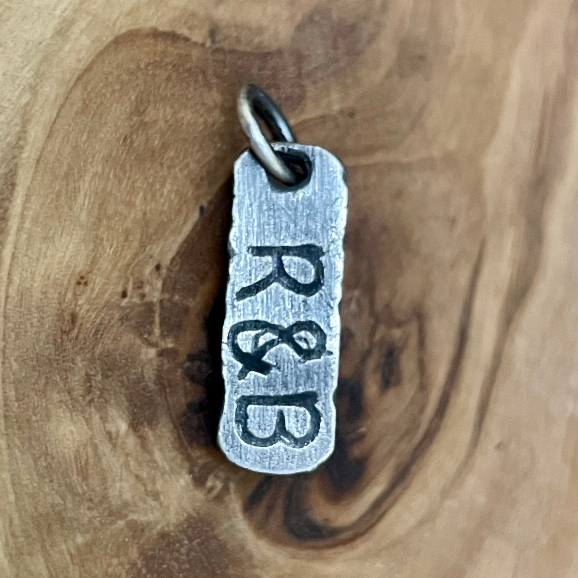 Rustic back side personalization of silver bar pendant with couples initials