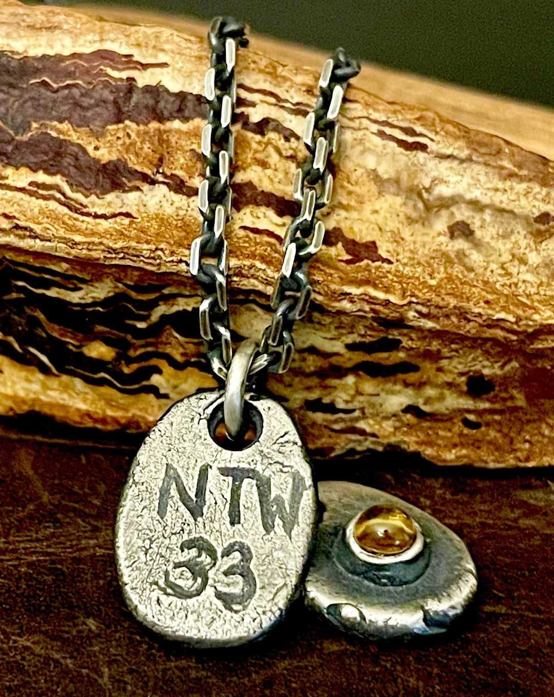 Birthstone Necklace Pendant with initials or numbers on back side. Wood display. 