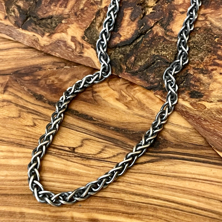 3.5mm wheat chain necklace with oxidized antique finish solid 925 sterling silver shown on wood background