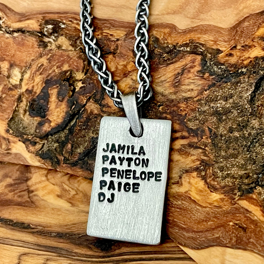 wheat chain shown with personalized Rectangle engraved pendant for men example by Ella Joli. Shown on wood background 