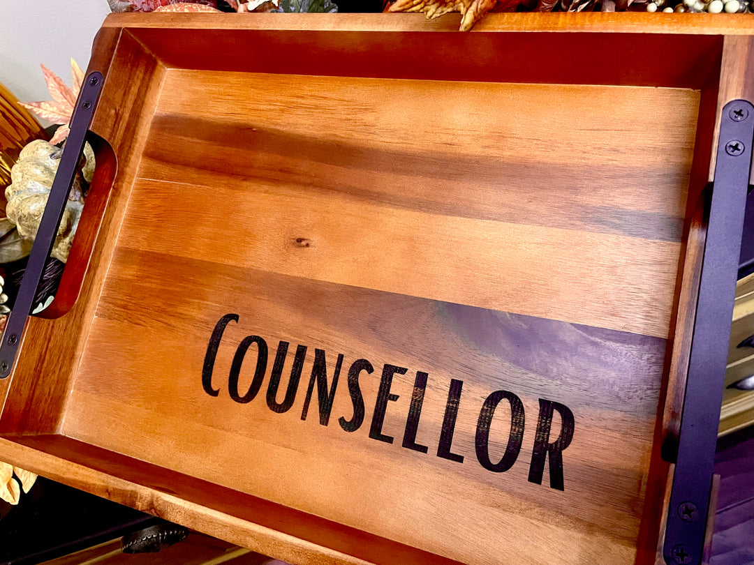 Wood and metal tray with last name engraved. 