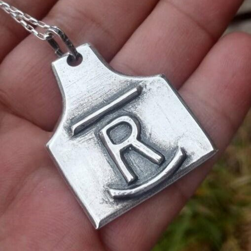Custom Silver Ranch Brand Pendant in Cow Ear Tag Shape, 1.5 inch heavy sterling silver, hand forged.  Rocking Bar Brand shown. Customize it your way. . 