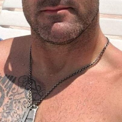 Solid 4x5mm sterling silver beveled cable chain necklace oxidized or polished elongated link. Shown on neck with pendants. 